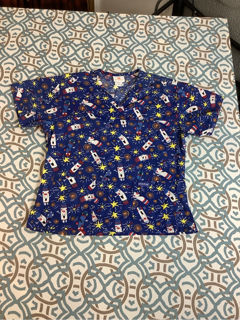 Peaches Uniforms Navy firecracker, scrub top